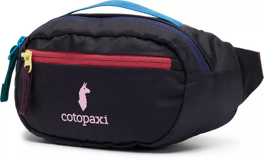Cotopaxi Kapai 1.5L Hip Pack Del Día Dark with a front red zipper, blue strap, and pink llama logo.