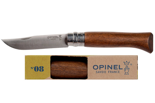 Opinel No.08 stainless steel folding knife with rich brown wooden handle and visible blade, next to its brown packaging.