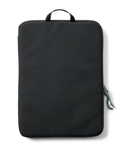 Cotopaxi Cada Dia 16-inch Laptop Sleeve in black, featuring a top handle and colorful zipper pull cord.