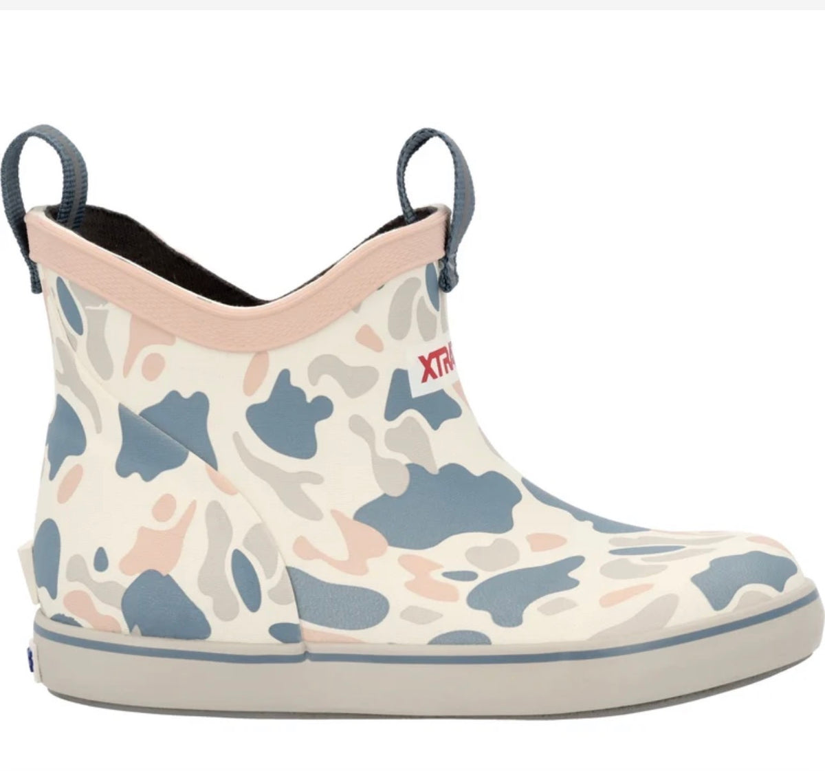 Xtratuf Kids' Ankle Deck Boot in cream, light blue, and pink camouflage pattern, with grey sole and pull tabs.