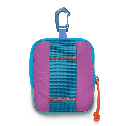 Cotopaxi Allpita Mini Bag in purple, blue, and teal with a blue carabiner clip, shown on a white background.