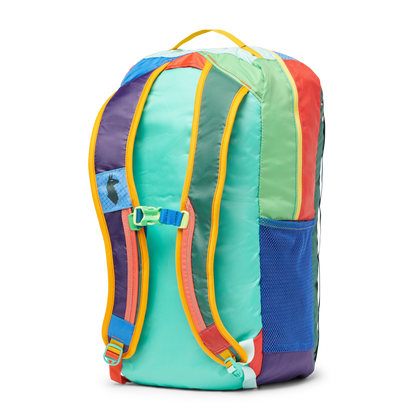 Cotopaxi Batac 24L Backpack, back view, multi-colored patchwork design with shoulder straps, a chest buckle, and a side mesh pocket.