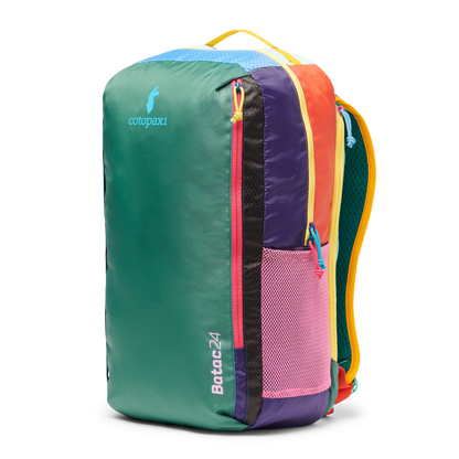 Cotopaxi Batac 24L backpack in vibrant multi-color design, featuring green front, pink accents, and side mesh pocket.