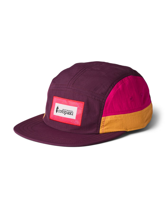 Zen Garden Tech 5-Panel Hat by Cotopaxi. Multi-color design featuring burgundy, bright pink, and gold panels with a logo patch.