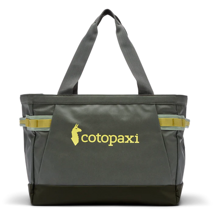 Allpa 30L Gear Hauler Tote by Cotopaxi in dark green with yellow logo and accents, front view on white background.