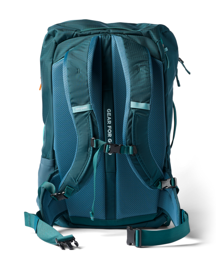 Cotopaxi Allpa 42L Travel Pack, back view showing padded mesh shoulder straps and hip belt in teal.