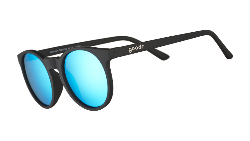 goodr Midnight Ramble at the Circle Bar sunglasses with matte black frames and vibrant blue mirrored lenses