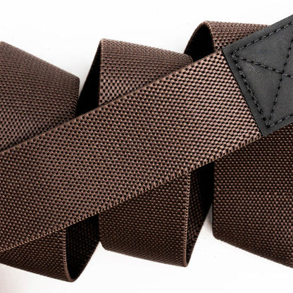 Brown woven Motion Stretch Belt from Arcade Belts, showing its textured fabric and durable stitching.
