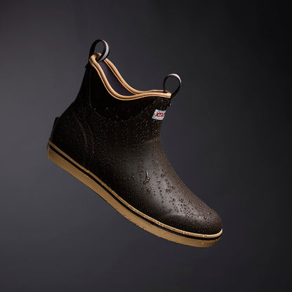 XTRATUF Men's Ankle Deck Boot Sport in brown, waterproof and ready for action, covered in water droplets.