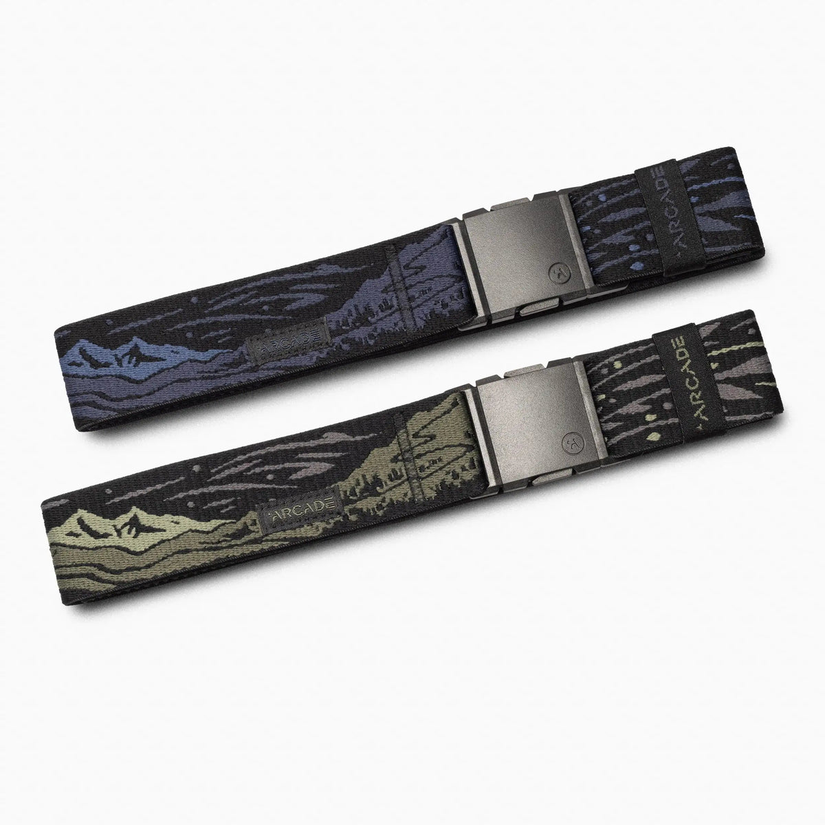 Two Arcade Out of Range Stretch Belts, one blue and one green, with mountain patterns and black buckles.