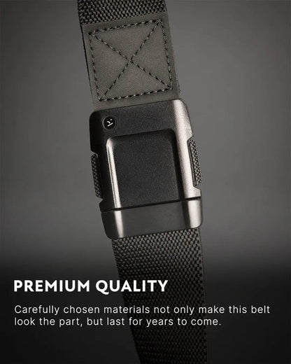 Close-up of black Motion Stretch Belt by Arcade Belts, showing its premium quality buckle and durable fabric.