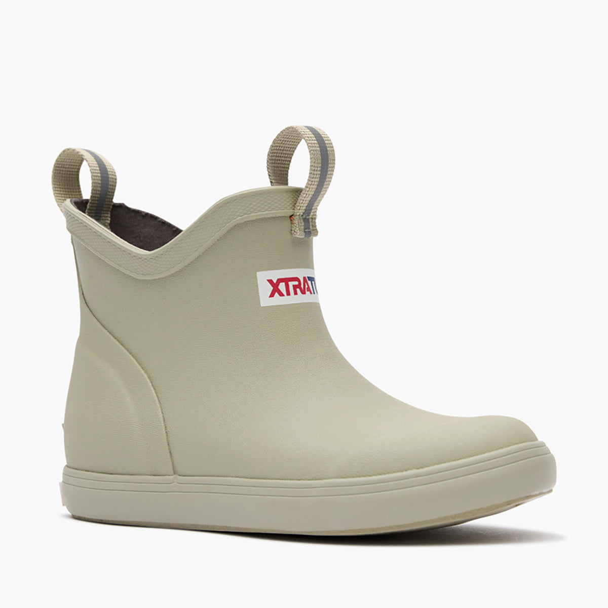 XTRATUF Kids' Ankle Deck Boot in stone color, showing the waterproof, slip-resistant design & pull tabs.