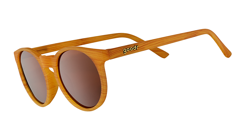 goodr Bodhi's Ultimate Ride sunglasses with light wood-grain frames and brown lenses, angled view