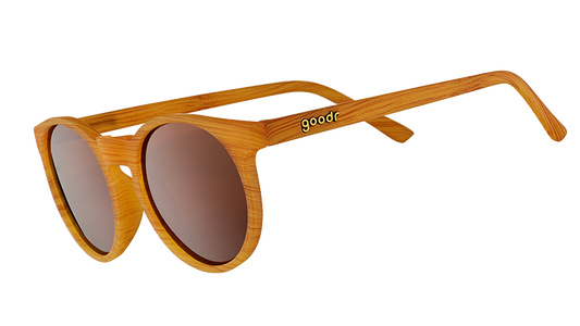 goodr Bodhi's Ultimate Ride sunglasses with light wood-grain frames and brown lenses, angled view