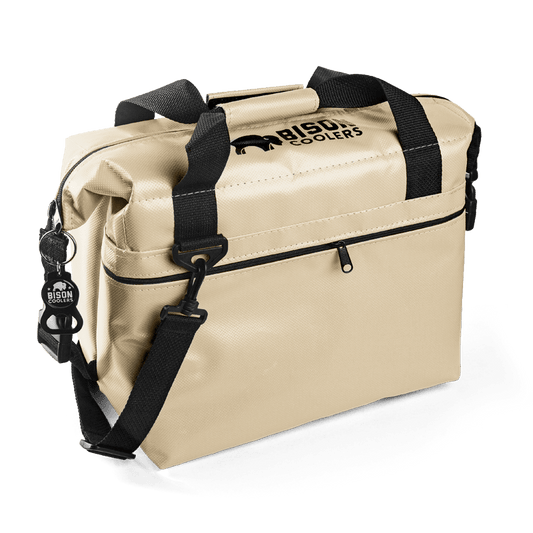 Bison Coolers 12-Can SoftPak Standard soft cooler bag in tan with black straps and bottle opener.