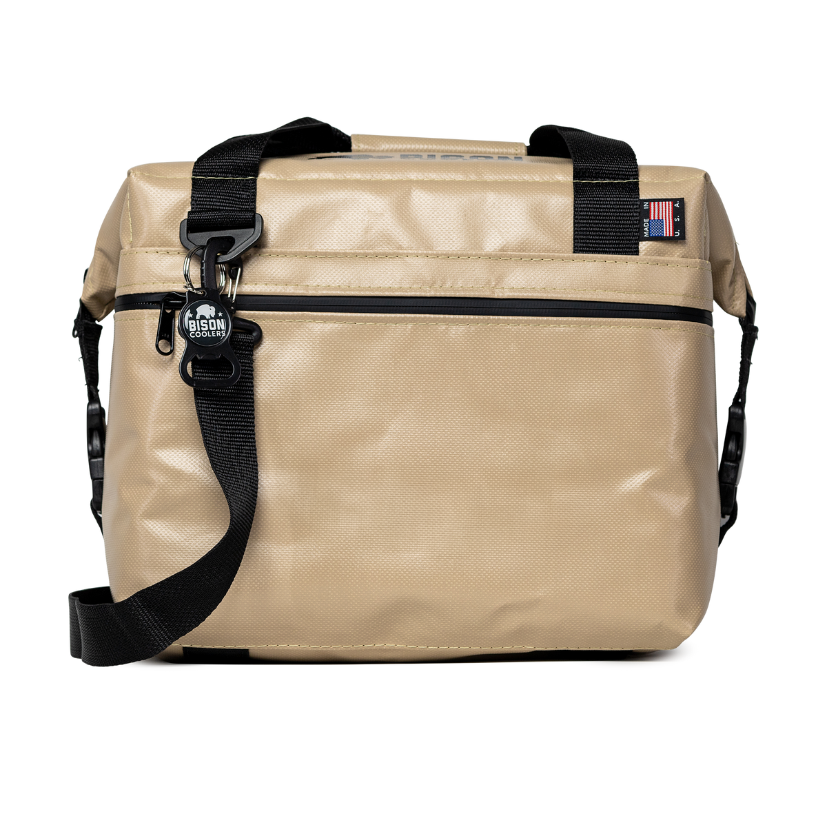 Tan Bison Coolers 12-Can SoftPak Standard cooler with black straps, bottle opener, and Made in USA tag.