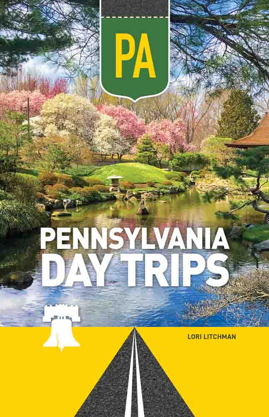 Pennsylvania Day Trips | Media Mercantile book cover. Scenic garden with pond, colorful flowering trees, road, Liberty Bell icon.