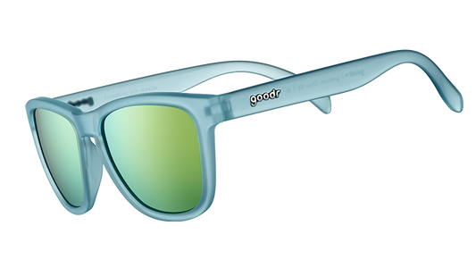 goodr Sunbathing with Wizards sunglasses: frosted light blue frame, bright green mirrored lenses.