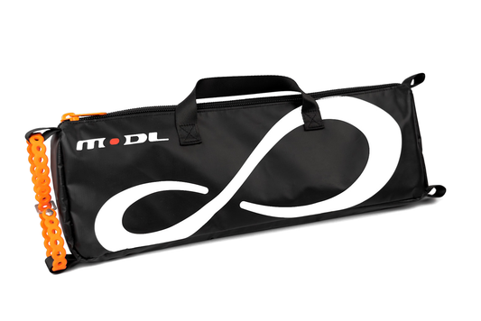 MODL Infinity Toolkit™ black carrying case with white infinity logo, orange zipper, and orange chain accessory.