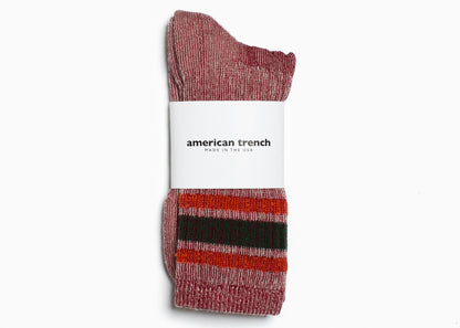 American Trench Merino Activity Crew socks, marled red and cream knit with orange and dark green stripes.