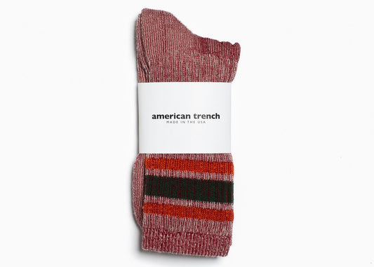 American Trench Merino Activity Crew socks, marled red and cream knit with orange and dark green stripes.