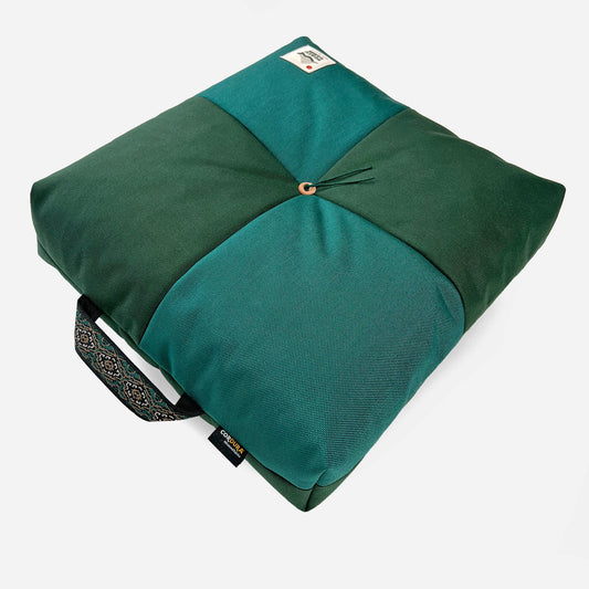 Wanderer 'QUAD' Outdoor Cushion. Dark & teal green fabric, square design with central button, patterned handle & Cordura.