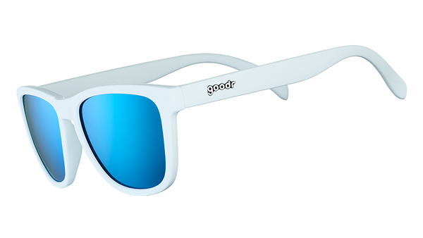 Iced by Yetis goodr sunglasses with light blue frames and bright blue mirrored lenses on a white background.