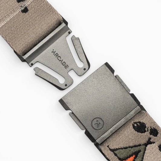 Arcade Belts Get Outside Stretch Belt with unfastened grey buckle and a tan patterned elastic strap.