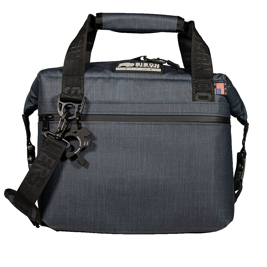 12-Can Hayden SoftPak Bison Cooler in dark grey with shoulder strap, top handle, front pocket, and Bison logo. Made in USA.