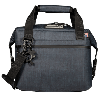 12-Can Hayden SoftPak Bison Cooler in dark grey with shoulder strap, top handle, front pocket, and Bison logo. Made in USA.
