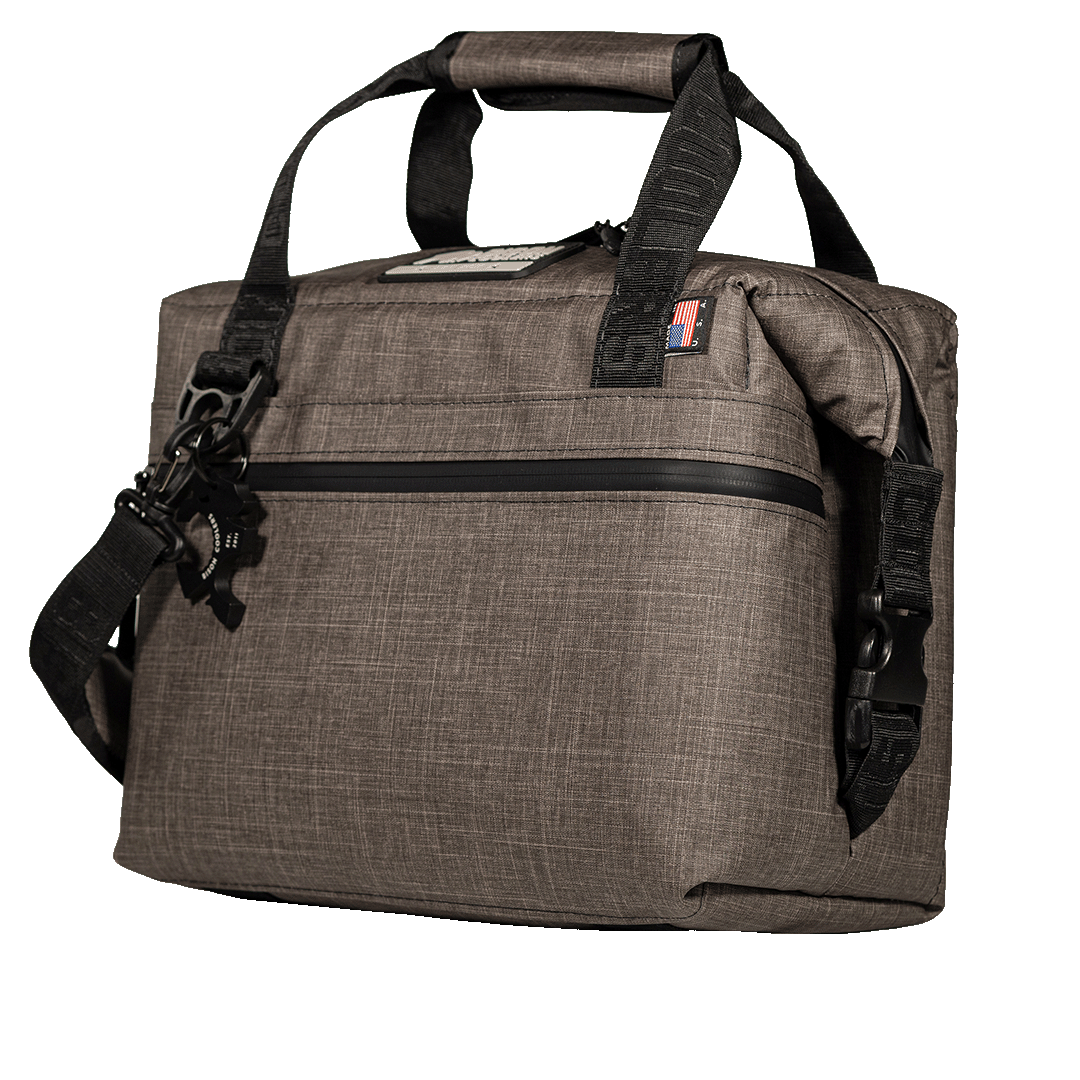 12-Can Hayden SoftPak Cooler from Bison Coolers, gray fabric, with black straps and zipper, angled view.