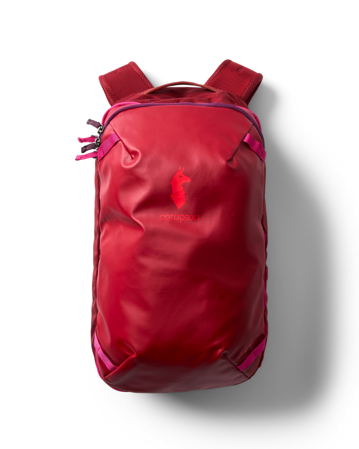 Red Cotopaxi Allpa Mini 20L Travel Pack on a white background, top-down view.