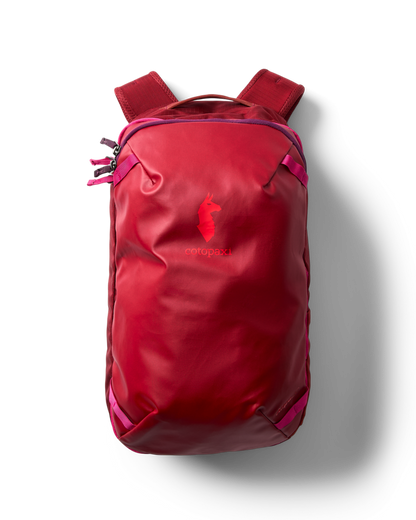 Red Cotopaxi Allpa Mini 20L Travel Pack on a white background, top-down view.