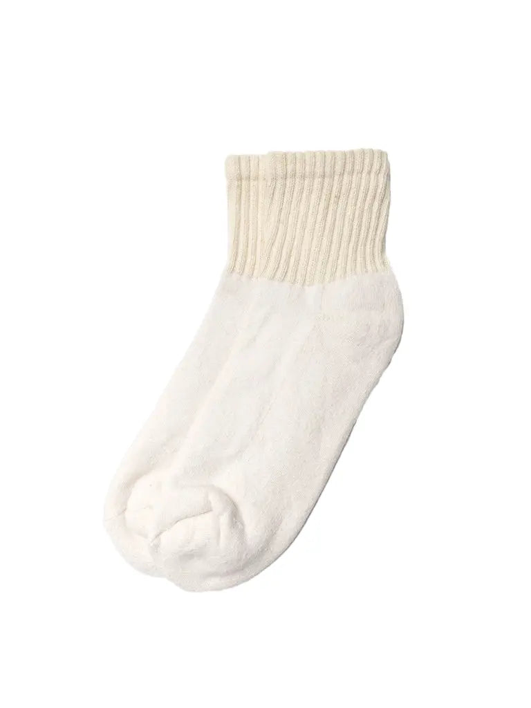 The Solids Quarter Crew American Trench sock, single off-white, ribbed cuff, white background