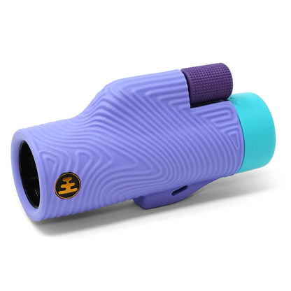 Nocs Provisions Field Tube 32mm Monocular, purple textured body, teal eyepiece, and dark purple focus wheel on white.