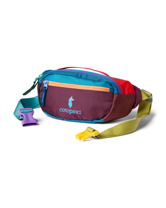 Cotopaxi Kapai 1.5L Hip Pack with multi-colored panels, featuring blue, maroon, orange, red, green straps, and bright buckles.