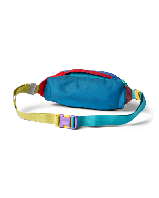 Cotopaxi Kapai 1.5L Hip Pack, multi-color fanny pack with blue, red, yellow, green straps & purple buckle.