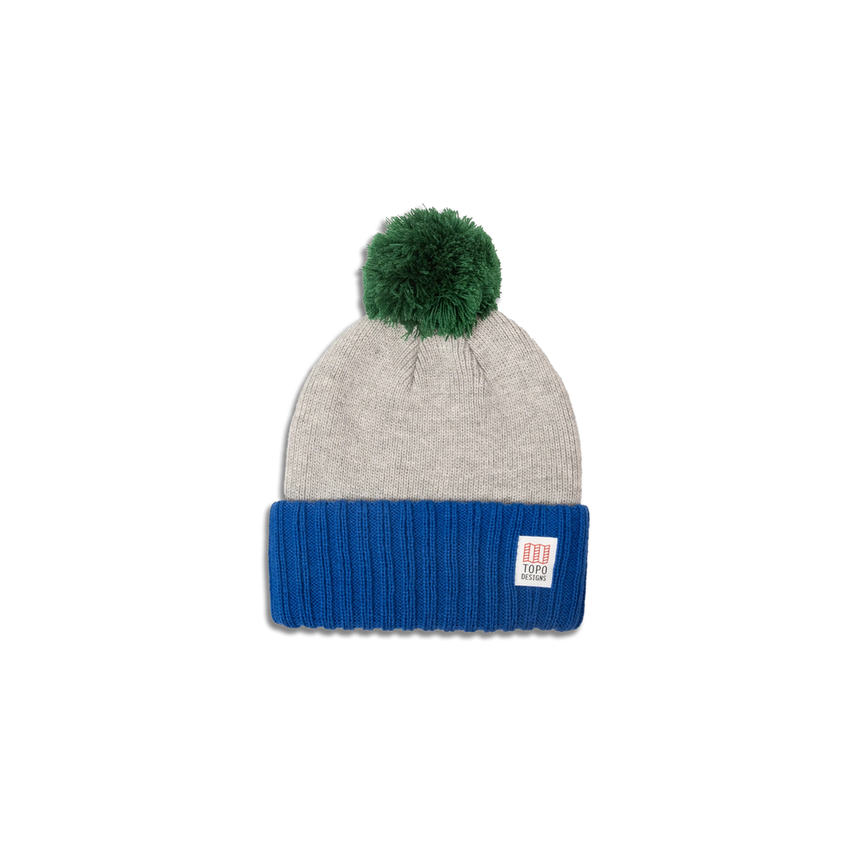 Topo Designs Pompom Beanie featuring a grey knit top, blue ribbed brim, and a fluffy green pompom.