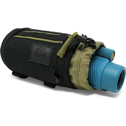 Black Nocs Provisions Tube Caddy with olive webbing, designed for carrying a monocular, shown with a blue monocular partially out.