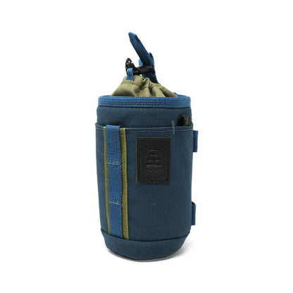 Nocs Provisions Tube Caddy, blue and olive green cylindrical bag with drawstring top and brand patch on a white background.