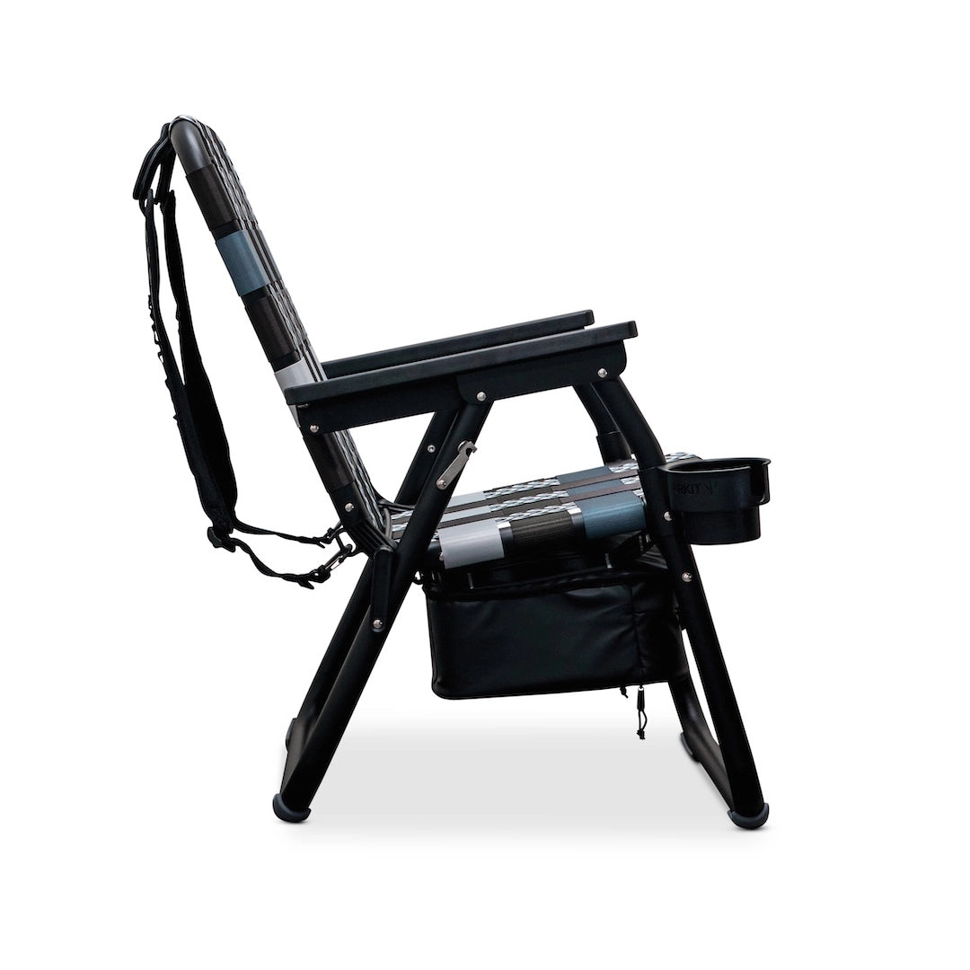 PARKIT Voyager Outdoor Chair with Cooler, black, side view, showing cooler bag, cup holder, and backpack straps.