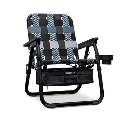 PARKIT Voyager Outdoor Chair with Cooler featuring black frame, patterned woven straps, cup holder, and attached cooler bag.