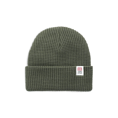 Topo Designs Waffle Knit Beanie in green, featuring a waffle knit texture and a branded label on the cuff.