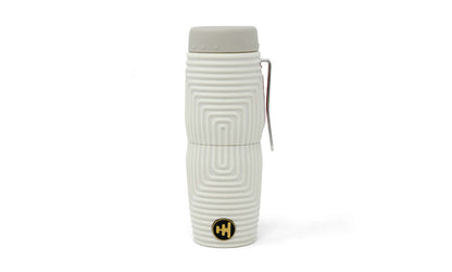 Nocs Provisions Zero Tube 10x25 Waterproof Monocular in white, featuring a textured body, gray cap, and metal clip.